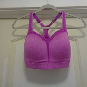 PINKY PURPLE SPORTS BRA MEASURES 30 IN AROUND C